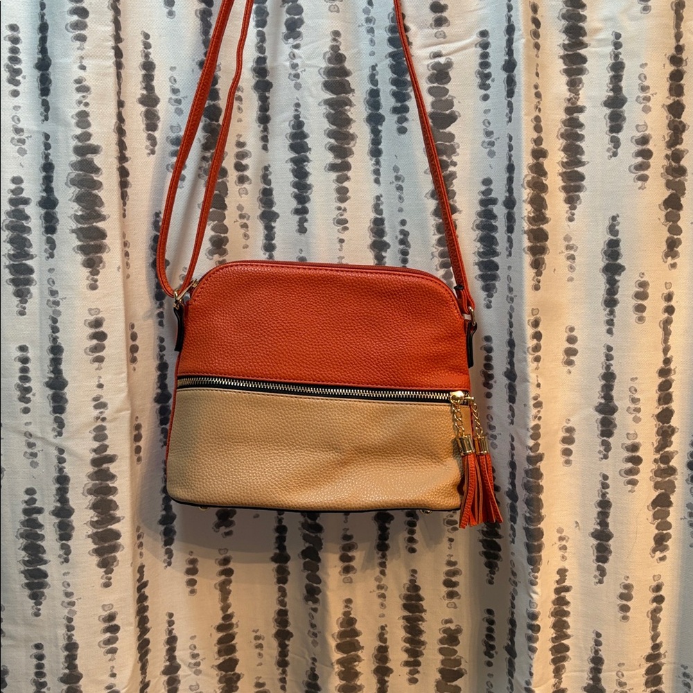 Two-Tone Crossbody Bag with Tassel and feet